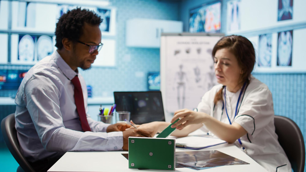 Consultants reviewing healthcare benefits documents