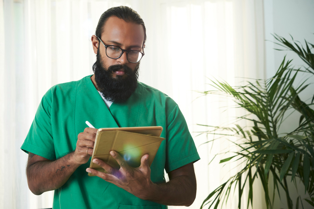 Analyst reviewing healthcare data charts